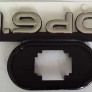 Monogram "1.9 DCI" links Renault Megane I (coupé).